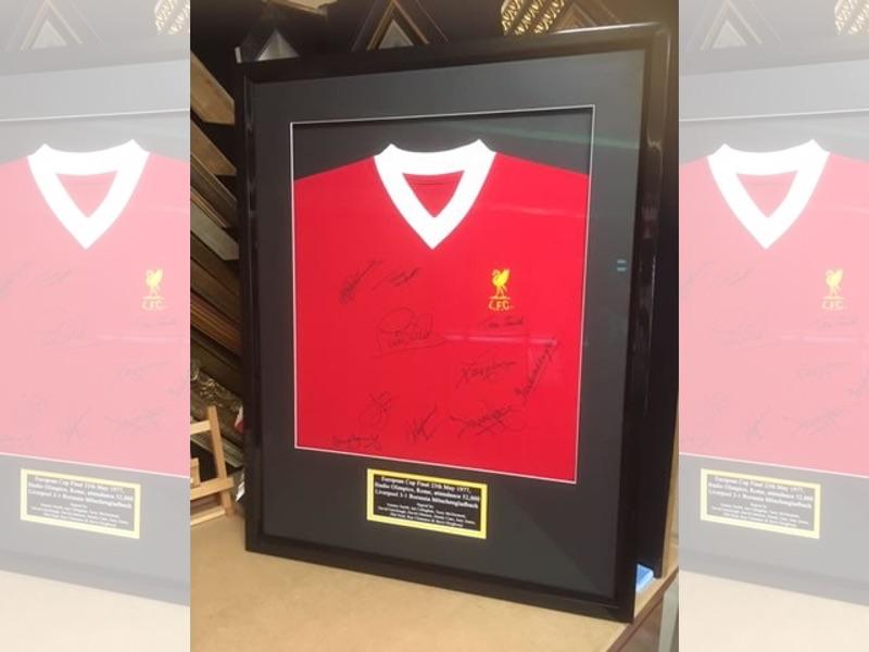 A signed 1977 Liverpool European Cup Final shirt framed in black gloss box frame