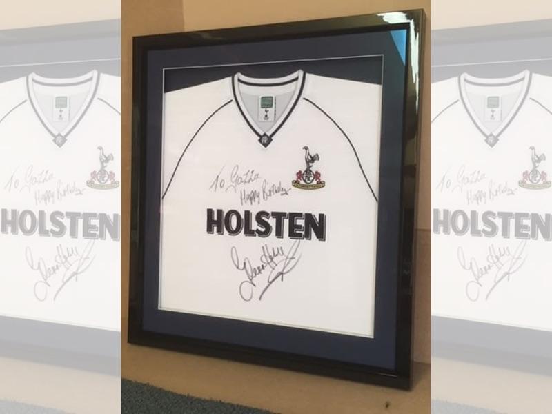 Signed Harry Kane Spurs shirt framed with a gloss black box frame.