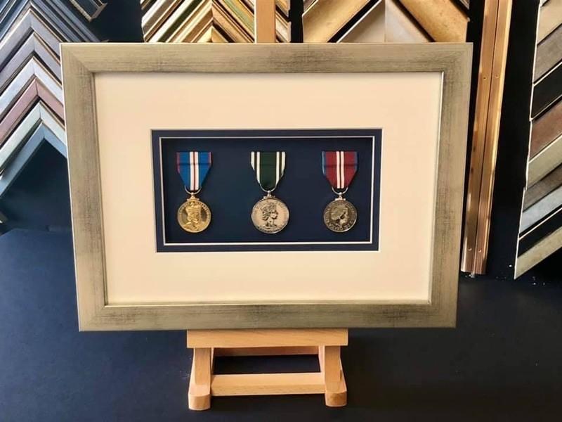 Medals awarded to a paramedic for long service and the Queen’s Jubilee’s 2002/2012. Framed with a distressed silver box frame, double mounted and glazed with Tru Vue reflection control glass. Medals awarded to a paramedic for long service and the Queen’s Jubilee’s 2002/2012. Framed with a distressed silver box frame, double mounted and glazed with Tru Vue reflection control glass.