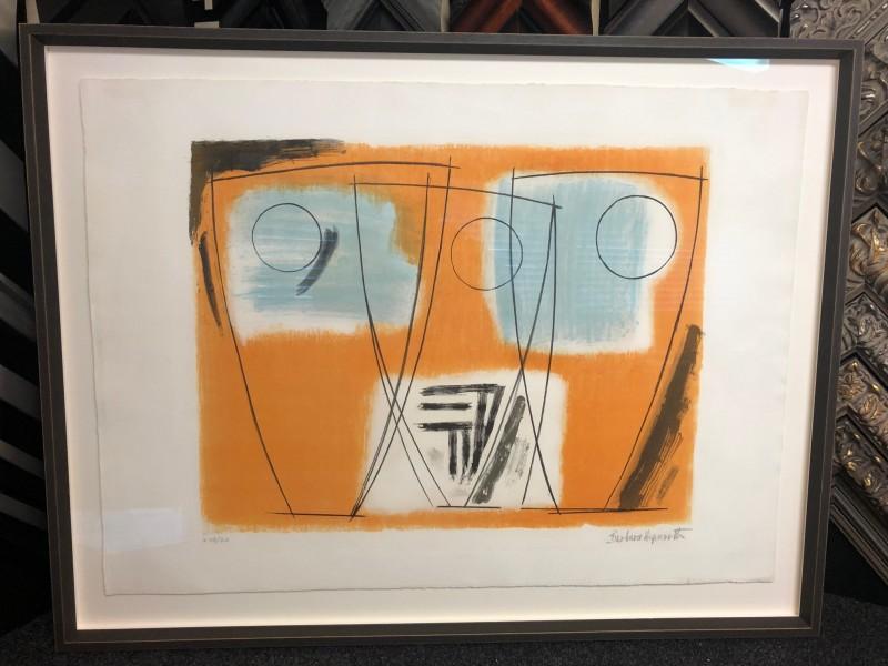 A signed and numbered limited edition print by British sculptor/artist Barbara Hepworth, framed with a dark oak moulding, float mounted and glazed with Tru Vue ready control glass.