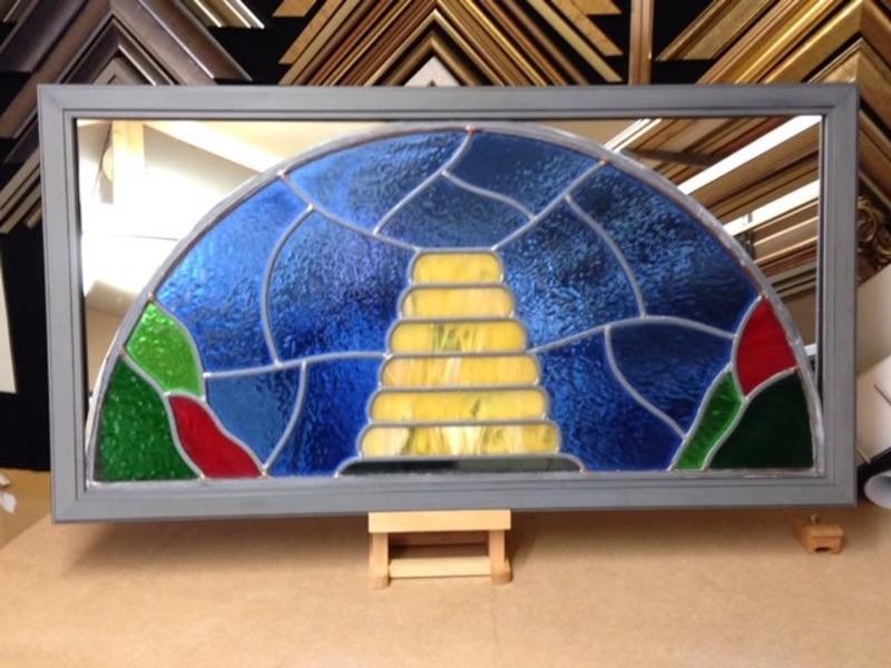 Framed stained glass mounted onto mirror for the Beehive in White Waltham Framed stained glass mounted onto mirror for the Beehive in White Waltham