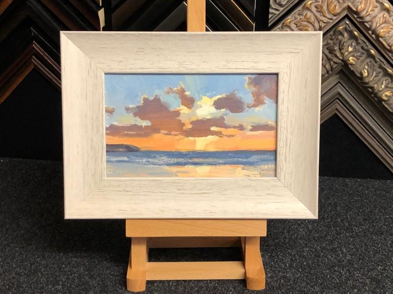 An oil painting on board, framed with a scooped white washed mouldings. An oil painting on board, framed with a scooped white washed mouldings.