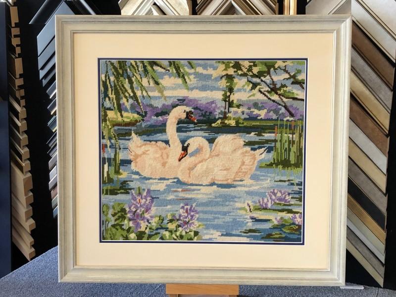 Tapestry stretched, double mounted and framed in a traditional silver moulding.