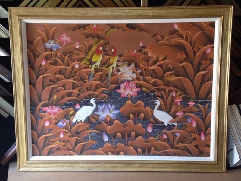 An original Chinese canvas oil painting framed in a hand finished gold moulding